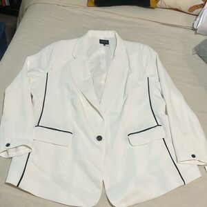 1. State white blazer with black piping